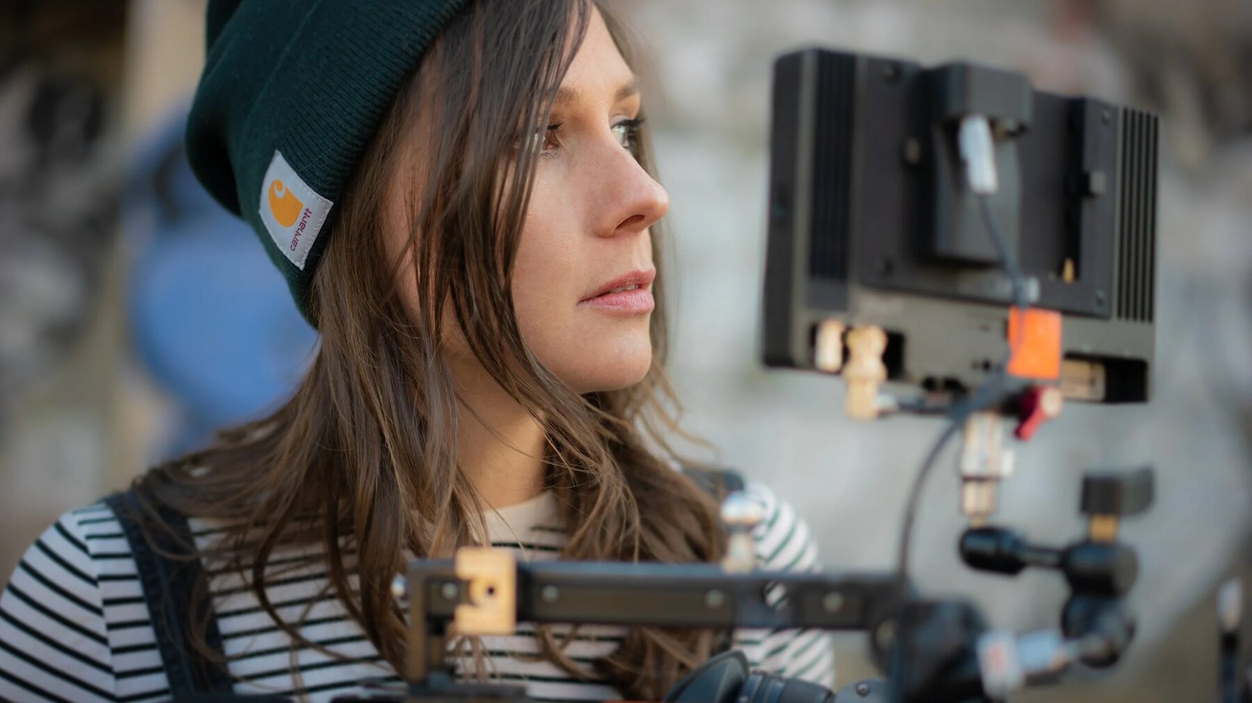 Taimi Arvidson looking toward a camera monitor